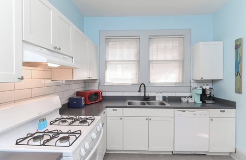 Columbia House | Walk or bike to Noma or Main Street district from this fun & peaceful retreat.