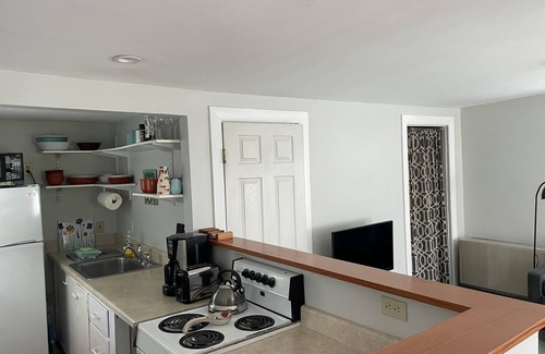 Newport East Cottage | Walk to Beach from sweet garden cottage. Monthly rate!