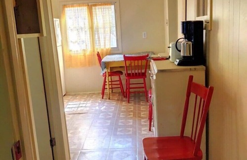 Tiny Cabin | walk to private beach across the street -2BR Cozy Forest Cabin -amazing sunsets