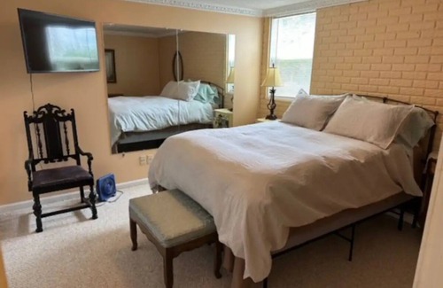 Republic Apartment | Walkout basement apartment with private patio supplied with a grill and fire pit