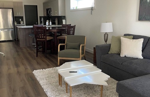 Lethbridge House | Walkout full separate 2BR 1Bath 3 queen beds suite. Separate entrance. Laundry.