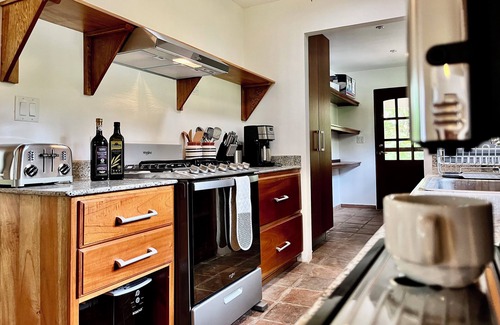 Hato Viejo House | Wanakaset 2 bedrooms riverfront house w/Private Garden & Shared Pool, 4 pax