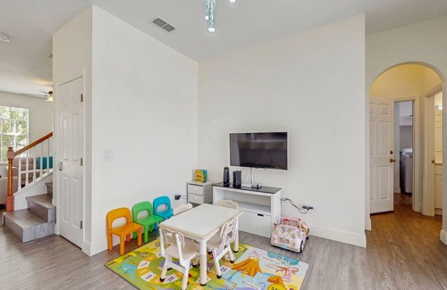 Trafalgar Village House | Water view retreat with lanai, heated pool, pool spa, game room, & AC