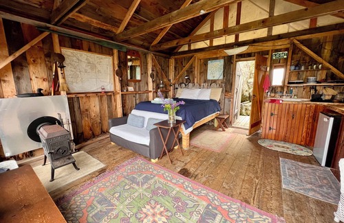 Bernard Cabin | Waterfront Cabin with Private Dock and Cobblestone Beach