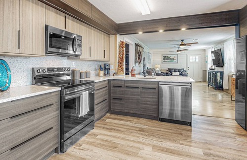 Satsuma House | Waterfront charmer with two docks, boat ramp, office, & gourmet kitchen