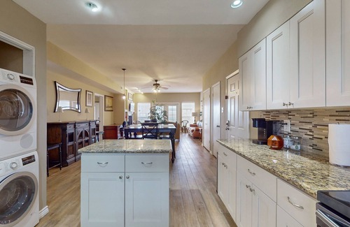 El Lago Condo | Waterfront community condo with on-site pool, water views, & private patio
