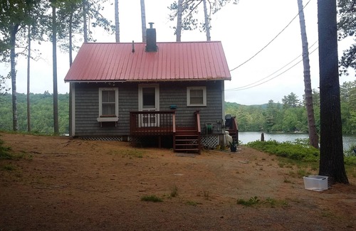 Bryant Pond Cabin | Waterfront cottage on Lake Christopher, screened in porch w/lake views, firepit