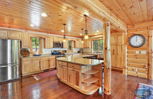 Whitewater House | Waterfront, Hand-Crafted Log Cabin |Sandy Beach |Dock |5200 Sq Ft |3.5 Acres |Stone Fireplace |Views