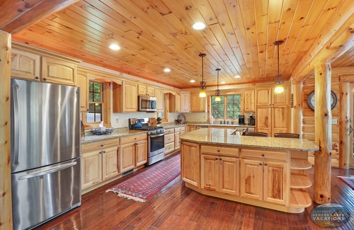 Whitewater House | Waterfront, Hand-Crafted Log Cabin |Sandy Beach |Dock |5200 Sq Ft |3.5 Acres |Stone Fireplace |Views