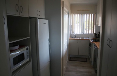 The Entrance Apartment | Waterfront Holiday Apartment, north facing, superb 180 deg views, sunny balcony