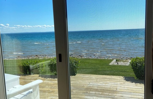 St Ignace House | Waterfront home on Lake Michigan with views of St Helena Island Lighthouse