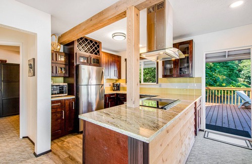 Anderson Island House | Waterfront Home w/Wraparound Deck, Grill, Pellet Stove, & Private Beach