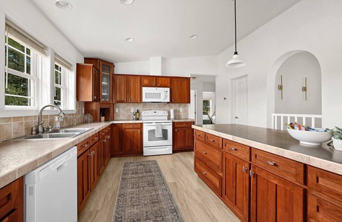 Marshland House | Waterfront Home with HOT TUB, Large Dock, Game Room, Movie Theater
