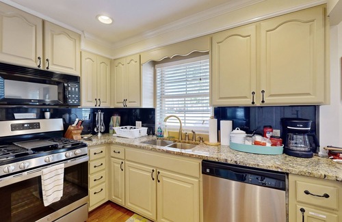 Northport House | Waterfront home with boat slip, dock, firepit, wood fireplace, streaming, & AC