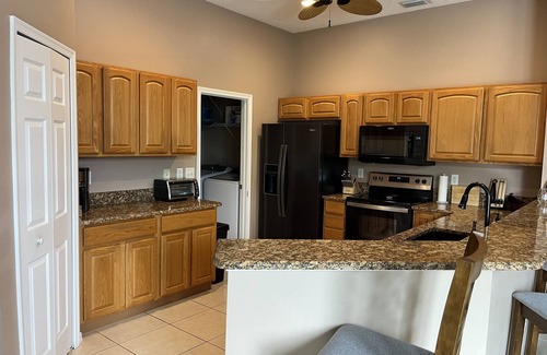 Palm City House | Waterfront house with dock, lift and hot tub
