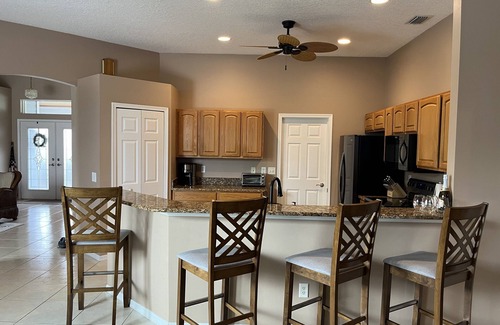 Palm City House | Waterfront house with dock, lift and hot tub