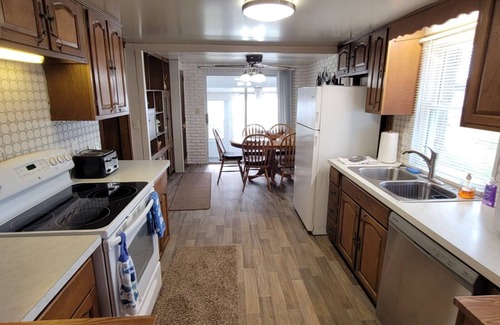 Fair Haven House | Waterfront Lake St Clair 2 covered boat wells with 2 Boat lifts, firepit,