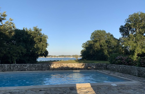 Baden House | Waterfront manor house with heated pool