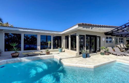 Cocoa Isles House | Waterfront Oasis - King Beds 10min Walk to Beach