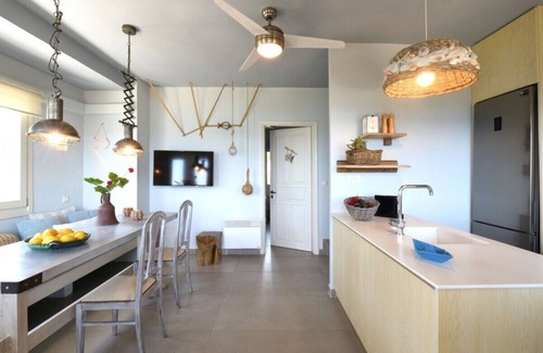 Amoudi Villa | Waterfront Villa Alexandros with Outdoor Jetted Tub