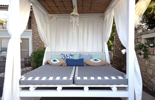 Amoudi Villa | Waterfront Villa Alexandros with Outdoor Jetted Tub