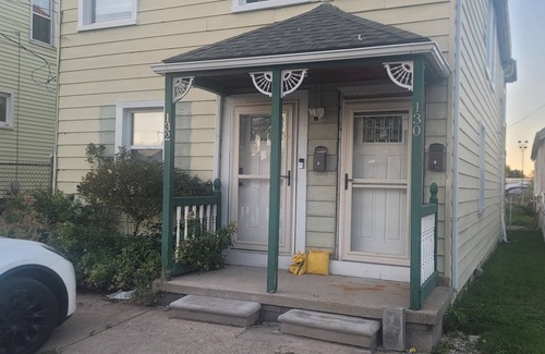 Wyandotte House | Waterfront with boat dock 1-bedroom on Detroit River canal. Good for 4 people