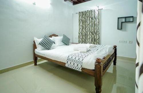 Krishnagiri Apartment | Wayanad Palm Grove Retreat 1st Floor
