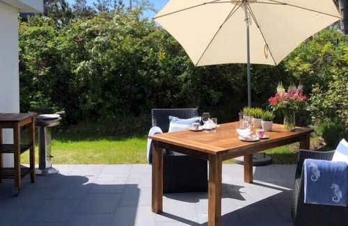 Wangerooge Apartment | WellenSpiel - unique atmosphere with rose garden