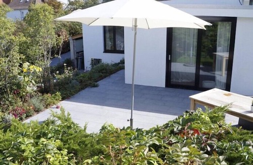 Wangerooge Apartment | WellenSpiel - unique atmosphere with rose garden