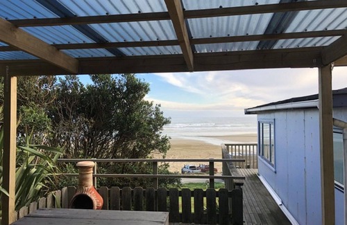 Glinks Gully House | West Coast Heaven. A rustic, cosy New Zealand bach.
