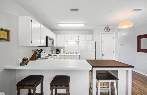 West Panama City Beach Condo | West End Gem | Walk to the Beach | Pool | Sleeps 4
