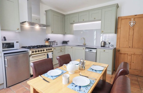 Kents Bank Cottage | WESTMORLAND COTTAGE, pet friendly, with a garden in Grange-Over-Sands