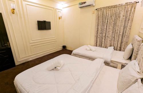 Gulshan-E-Jamal Bed & Breakfast | White Rose Family BNB - Near Agha Khan Hospital