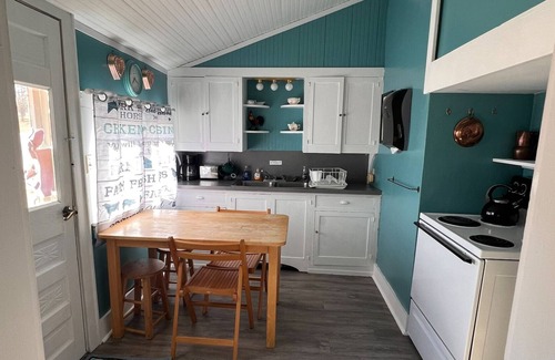 Coon Rapids Cottage | Whiterock Conservancy - Hollyhock Cottage