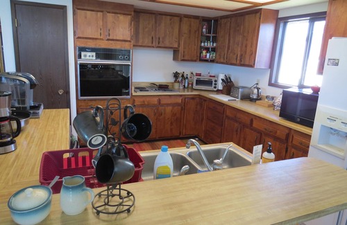 Kettle Falls House | Whole house with four bedrooms, laundry room, hot tub, living and dining room.