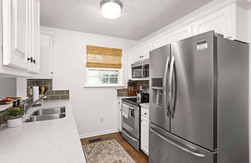 Maplewood Heights House | Wildcat Cottage, Enchanting Home Ten Minutes to Downtown