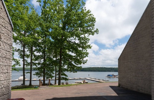 Thayerville Condo | Will O' The Wisp 104B: Lakefront One Bedroom Condo with 2 Fireplaces & Flat Scre