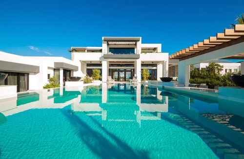 Juba Sound Villa | Wind Chime in Providenciales by Personal Villas - Turquoise Ocean Views
