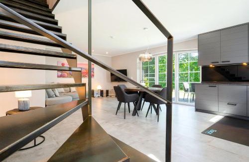 Eilsum House | Wind in den Bäumen