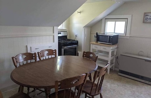 Winnisquam House | Winnisquam Lakeside Funky Ski Chalet w-Sandy Beach & Boat Docks