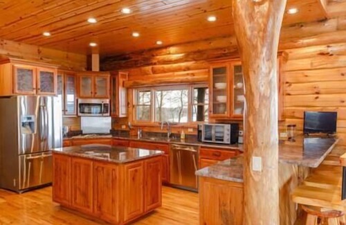 Cassville House | Wisconsin Luxury Log Mansion | Sleeps 15