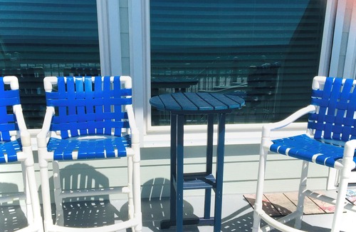 Southport House | Wonderful location! Walk out to your deck-feet are in sand! View is remarkable!