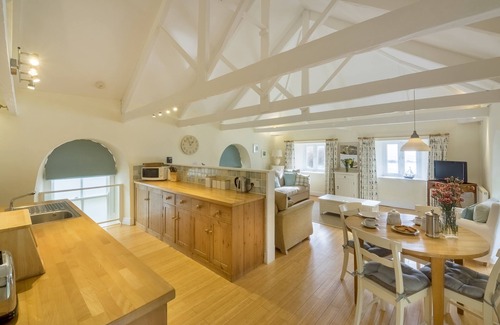 Portholland Cottage | Wonderful reverse level conversion located on the sea front in picturesque rural hamlet on the South
