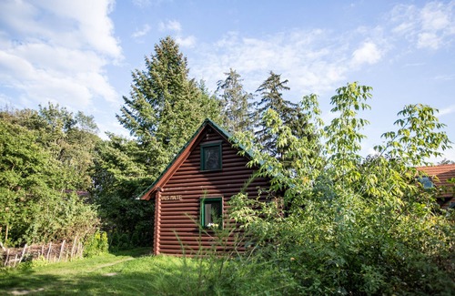 Templin House | Woodblockhouse on lakeland in between nature to relax with fireplace