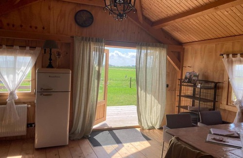 Tjerkgaast House | Wooden House in Friesland with Farm Experience