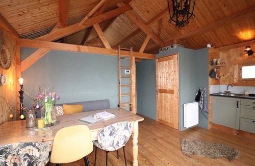 Tjerkgaast House | Wooden House in Friesland with Farm Experience