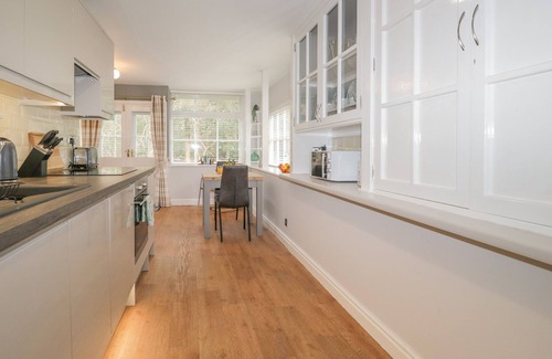 Meathop Cottage | WOODLAND LODGE, romantic, with a garden in Grange-Over-Sands