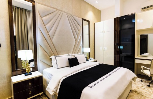 Orozo Hotel | Yellow Trumpet Residence Asokoro