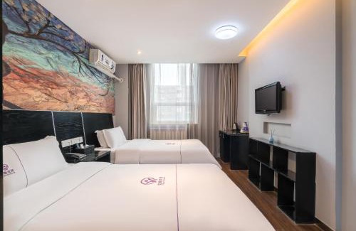 Middle Chaoyang Hotel | Yihai Cultural Hotel Coffee, fruits, snacks, a gym and a laundry room are provided for free in the lobby