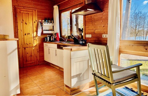 Rutenberg House | Your beautiful house on the lake with a fireplace, sauna and great lake view! With e-charging station